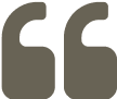 Double quotation mark symbol in dark gray.